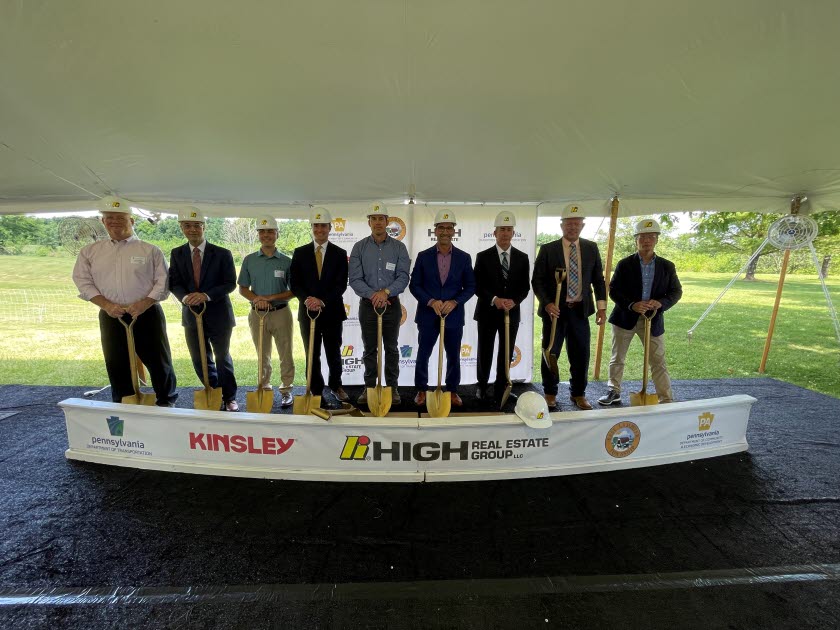 High and community leaders posing for groundbreaking photo