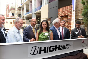 Signing the ceremonial beam, L-R: Randall Horst, Chair, Redevelopment Authority of the City of Lancaster; S. Dale High, Chair Emeritus, High Companies; Mark Fitzgerald, President and COO, High Real Estate Group LLC; Mayor Danene Sorace, City of Lanca